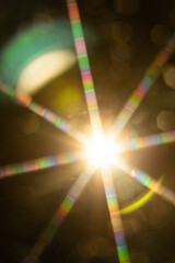 Abstract sun flare. The lens flare is subject to digital correction