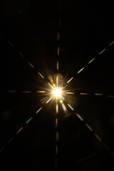 Abstract sun flare. The lens flare is subject to digital correction