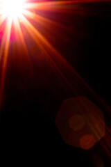 Blurred image Sun flare on the black background