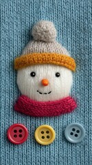 Snowman with colorful buttons and knitted hat