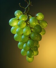 A fresh bunch of succulent green grapes with glistening water droplets illuminated by a warm, dramatic light