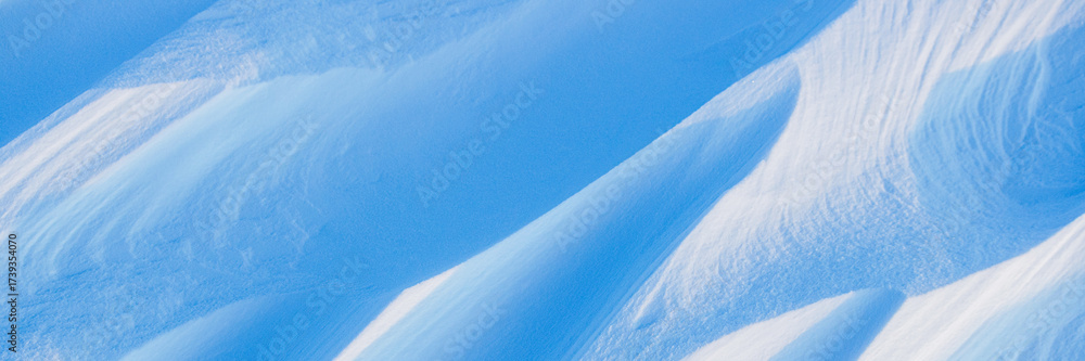 Sticker snow texture. wind sculpted patterns on snow surface. wind in the tundra and in the mountains on the