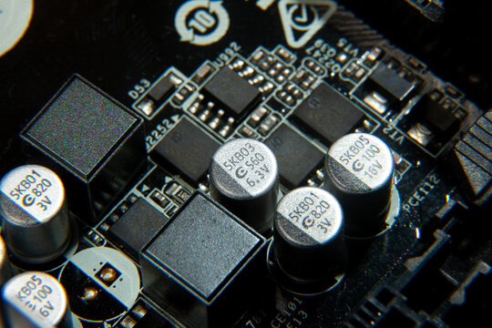 A close-up view of an electronic printed circuit board with assembled radio components