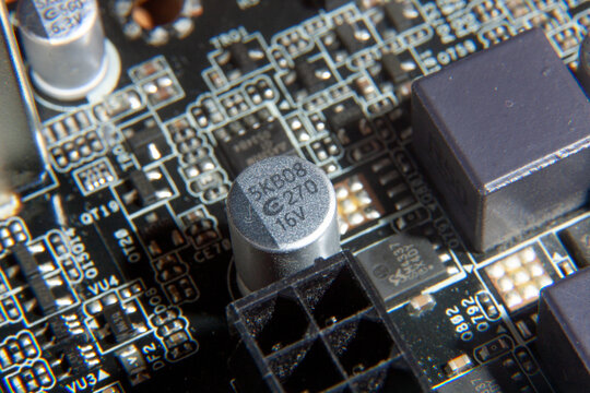 A close-up view of an electronic printed circuit board with assembled radio components