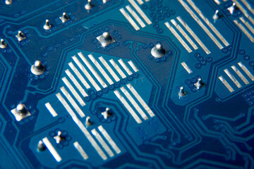Close-up of a blue electronic circuit board