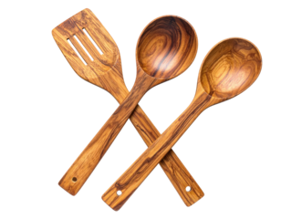 Three wooden kitchen utensils crossed on a black background, showing grain detail
