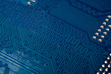 Close-up of a blue electronic circuit board