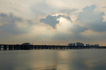 Fototapeta premium Sunset scenery of Qianhai Bay at Qianhai Stone Park in Shenzhen，china