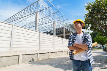 Asian engineer planning new building construction project