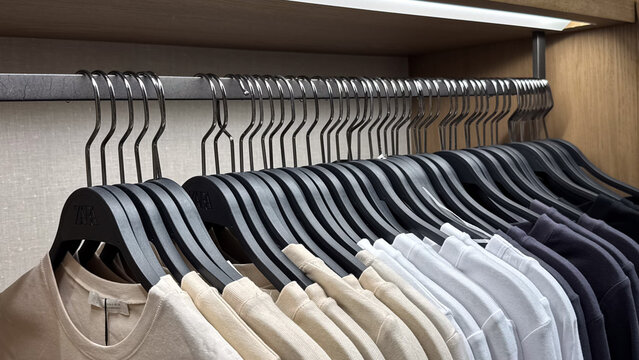 Things in the store hang in a neat row on hangers