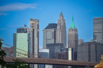 Obraz premium 40 Wall Street (The Trump Building): This is the slender, historic skyscraper with the prominent green/gold pyramid-shaped roof and spire. Lower Manhattan skyline in New York City