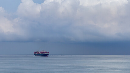 Container ship cargo shipping business logistic import and export freight transportation by container ship in open sea, Container loading cargo freight ship boat.