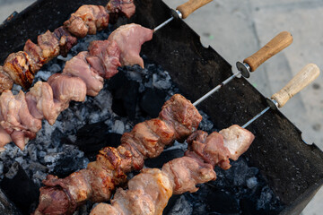 Traditional souvlaki skewers grilled on charcoal 