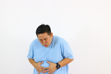 Man experiencing abdominal pain clutching stomach discomfort health issue