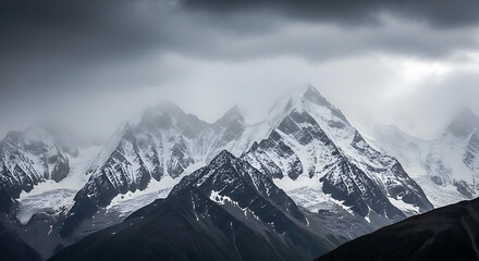 Snowy mountain peaks under a cloudy sky with fog rolling through the mountain range landscape view ai generated