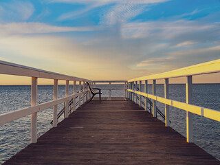 pier on the sea at sunset time