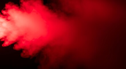 Dramatic red smoke or vapor effect on black background for overlay use