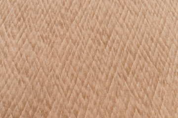 The sea and wind create soft textures in the sand on the beach, a backdrop for presentations.