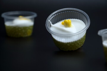 "Corn Tako" is a traditional Thai dessert with beautiful colors and delicious flavors.