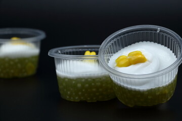 "Corn Tako" is a traditional Thai dessert with beautiful colors and delicious flavors.