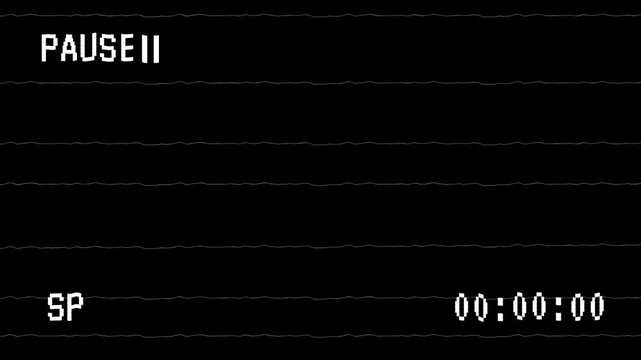 VCR playing and pausing a VHS blank tape on black background. 4K Video