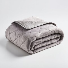 Weighted blanket with quilted pattern in soft grey fabric and glass bead filling on clean white background