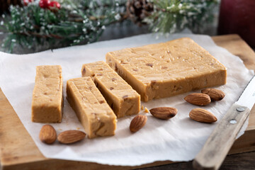 Christmas soft almond nougat bar on wooden table