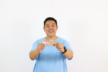 Excited Man Holding Cash Celebrating Success