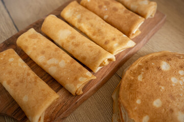 lots of pancakes on a plate 