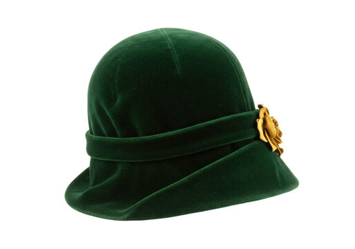 Elegant green velvet cloche hat isolated, vintage fashion headwear with gold flower accent for formal events and historical reenactments