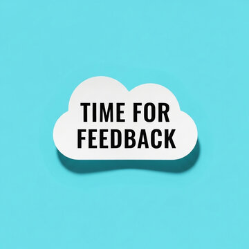 White cloud shape with the words time for feedback on a blue background