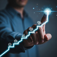 Businessman touching a glowing upward trend line with icons representing business growth