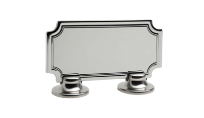 A shiny, silver nameplate rests on two rounded pedestal stands. Dark background creates contrast