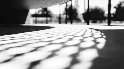 Abstract black and white image of a modern architectural detail with shadows