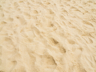 Nature travel background, sand beach close up texture summer desert zen garden coast ocean for vacation, hot tropical scene nature, holiday dune pile dry brown heap