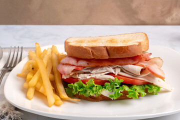 turkey blt sandwich with fries