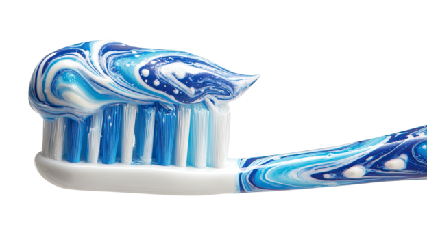Close-up of a toothbrush head with multi-colored, swirling paste, isolated on a black background