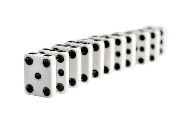 Close-up shot of ten rectangular white game pieces with black dots in a diagonal arrangement