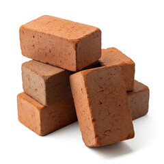 Pile of red clay building bricks stacked on a white background