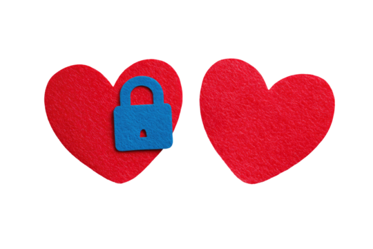 Two red heart shapes, one with a blue lock on, isolated against a black background - Powered by Adobe