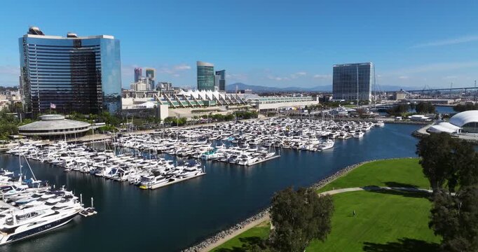Docked Boats At The Marina In San Diego Bay Skyline In California, United States. Aerial Drone Shot