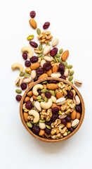 Healthy mixed nuts and dried fruit trail mix in a bowl