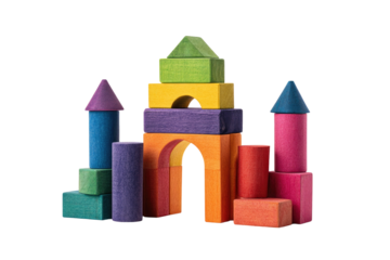 A colorful toy castle meticulously constructed with wooden blocks against a clean black background