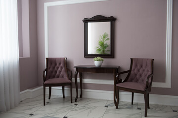 A mirror in a mysterious room. Classic austere interior.