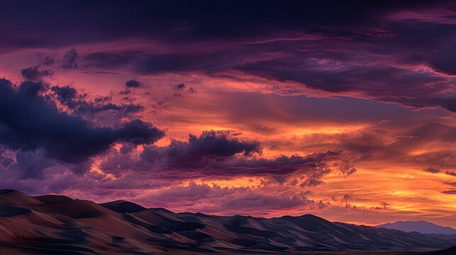 Vivid sunset paints the sky with a dramatic blend of orange, purple, and pink hues, casting a soft glow across the undulating sand dunes in the foreground as dark, moody clouds dominate the vast... - Powered by Adobe