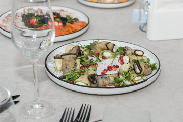 Food on the festive table. Cold appetizers for the banquet.