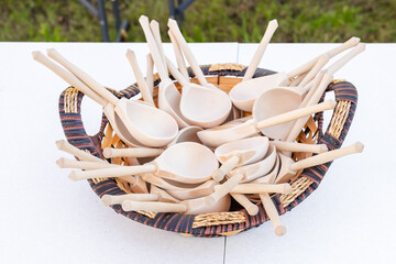 Wooden spoons in a cup. Rustic tableware for food.