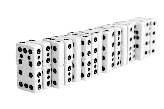 Array of dominoes, white with black pips, standing upright ready to fall in sequence