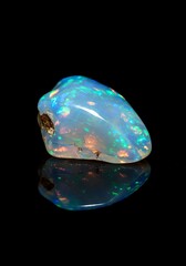 Colorful Opal Gemstone with Iridescent Play of Colors on Black Background