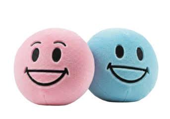 Two plush emoji balls isolated, pink and blue smiley face toys on transparent background, cute round cushions for kids